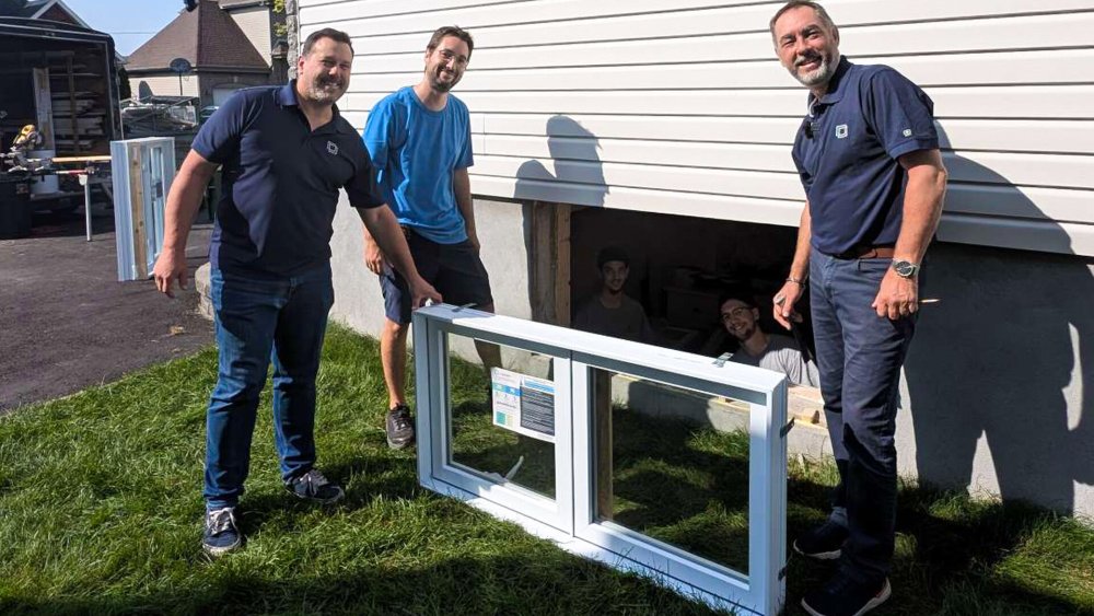 A team installing an Egress window